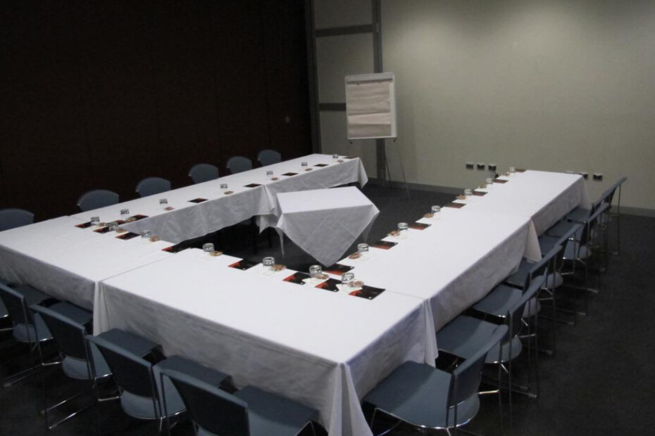 Atrium meeting space with U-shaped table